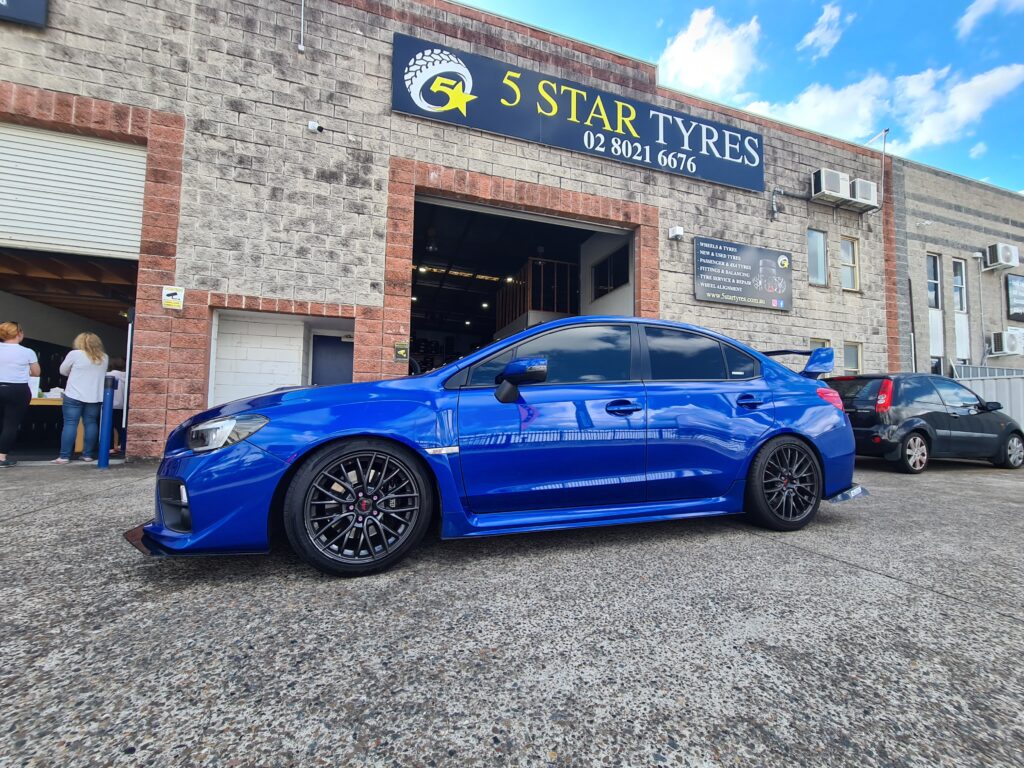 5 Star Tyres Shop Front Blue Subaru